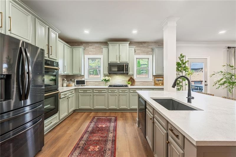 7 bedroom, 5 bathroom, 5,350 sq ft single family residence for sale at 4665 Osprey Court, Cumming, GA 30040 — photo 3