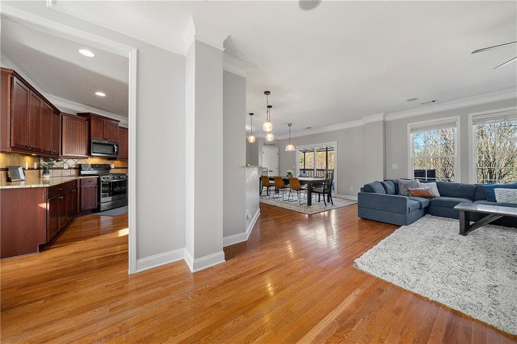6 bedroom, 5 bathroom, 5,268 sq ft single family residence for sale at 3593 Quillback Court, Atlanta, GA 30349 — photo 6