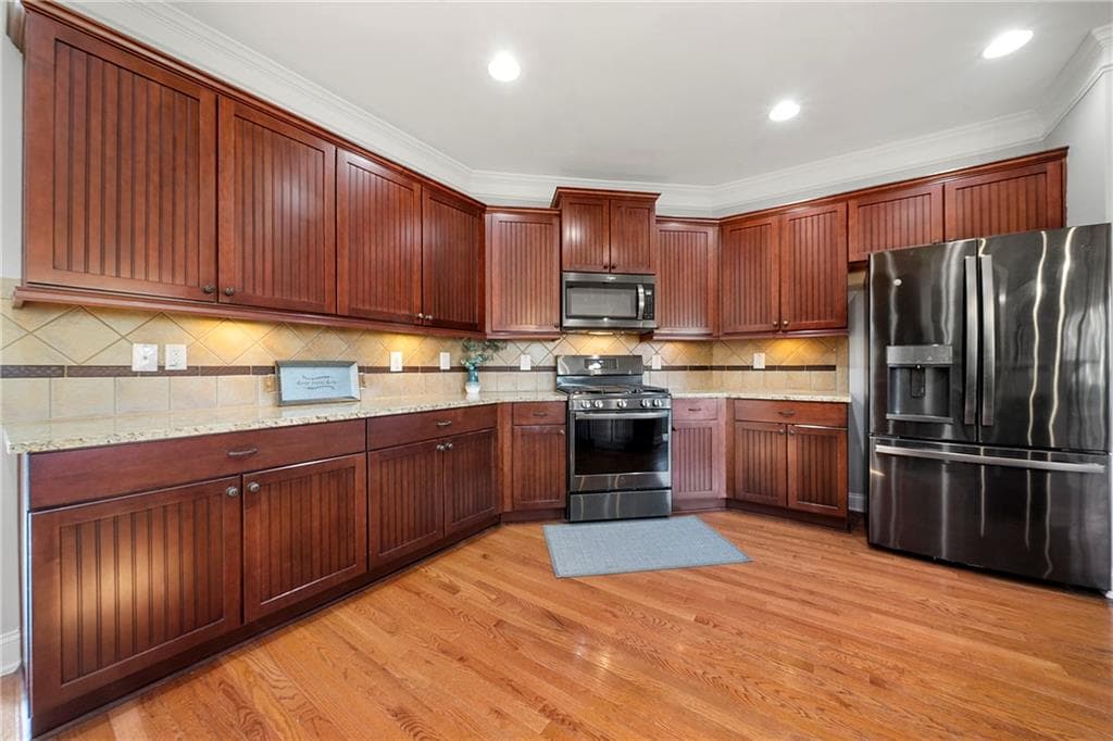6 bedroom, 5 bathroom, 5,268 sq ft single family residence for sale at 3593 Quillback Court, Atlanta, GA 30349 — photo 10