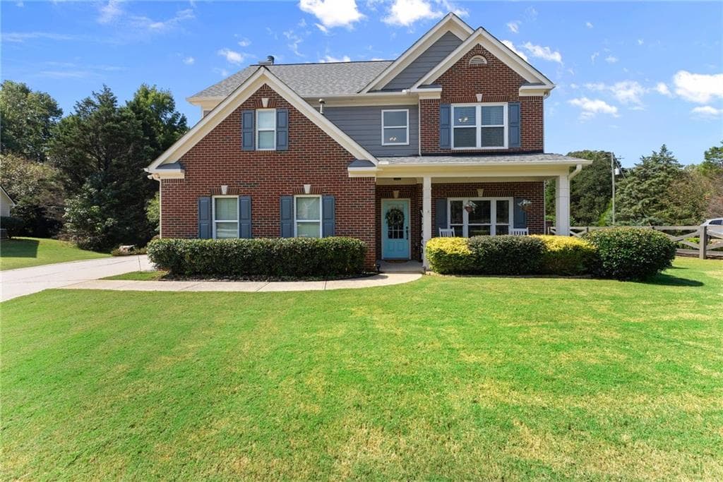 4 bedroom, 3 bathroom, 2,364 sq ft single family residence for sale at 6104 Saddlehorse Drive, Flowery Branch, GA 30542 — photo 2