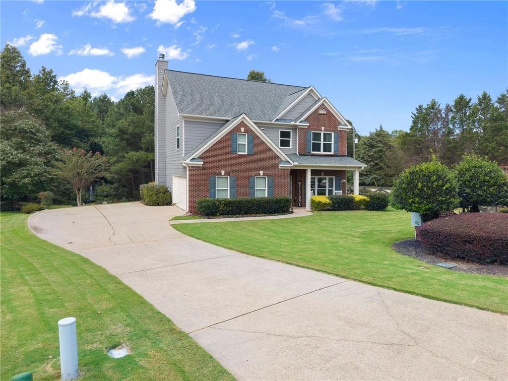 4 bedroom, 3 bathroom, 2,364 sq ft single family residence for sale at 6104 Saddlehorse Drive, Flowery Branch, GA 30542 — photo 3