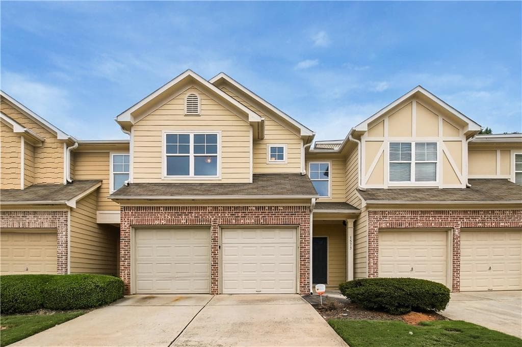 3 bedroom, 3 bathroom, 1,836 sq ft townhouse for sale at 1573 Park Brooke Circle, Marietta, GA 30008 — photo 1 of 40