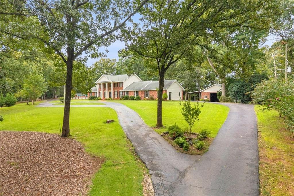 5 bedroom, 5 bathroom, 4,439 sq ft single family residence for sale at 6544 Cleveland Highway, Clermont, GA 30527 — photo 4