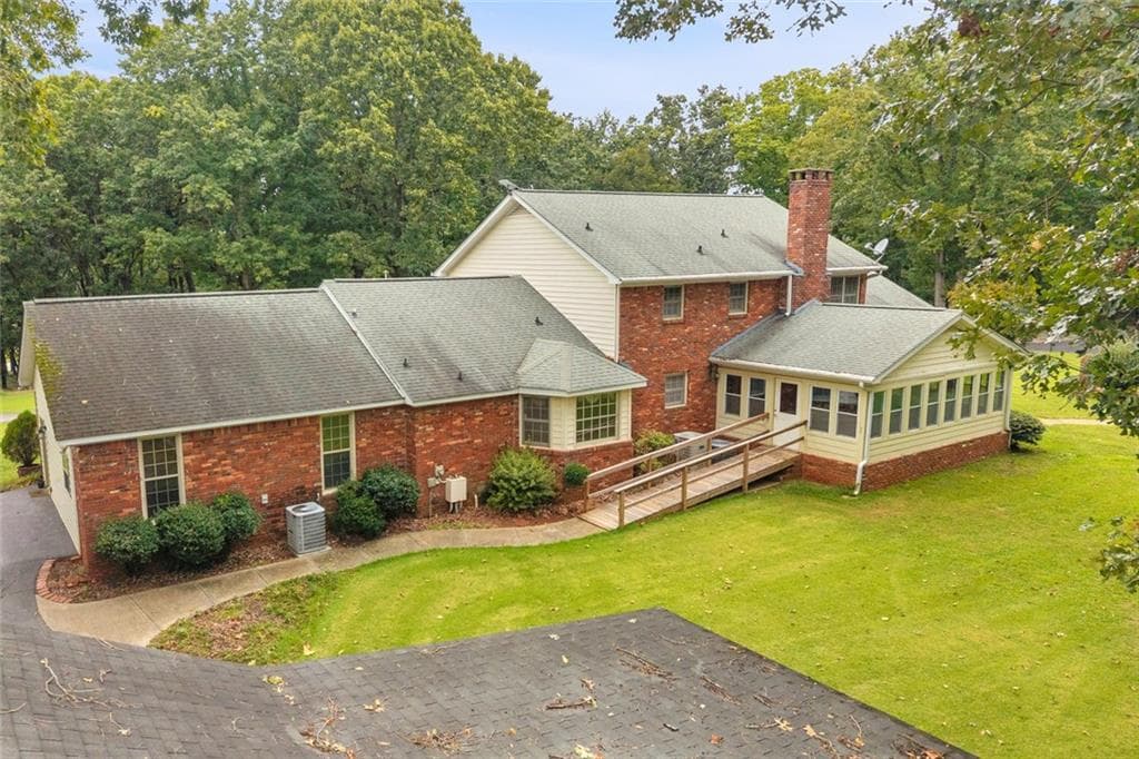 5 bedroom, 5 bathroom, 4,439 sq ft single family residence for sale at 6544 Cleveland Highway, Clermont, GA 30527 — photo 8