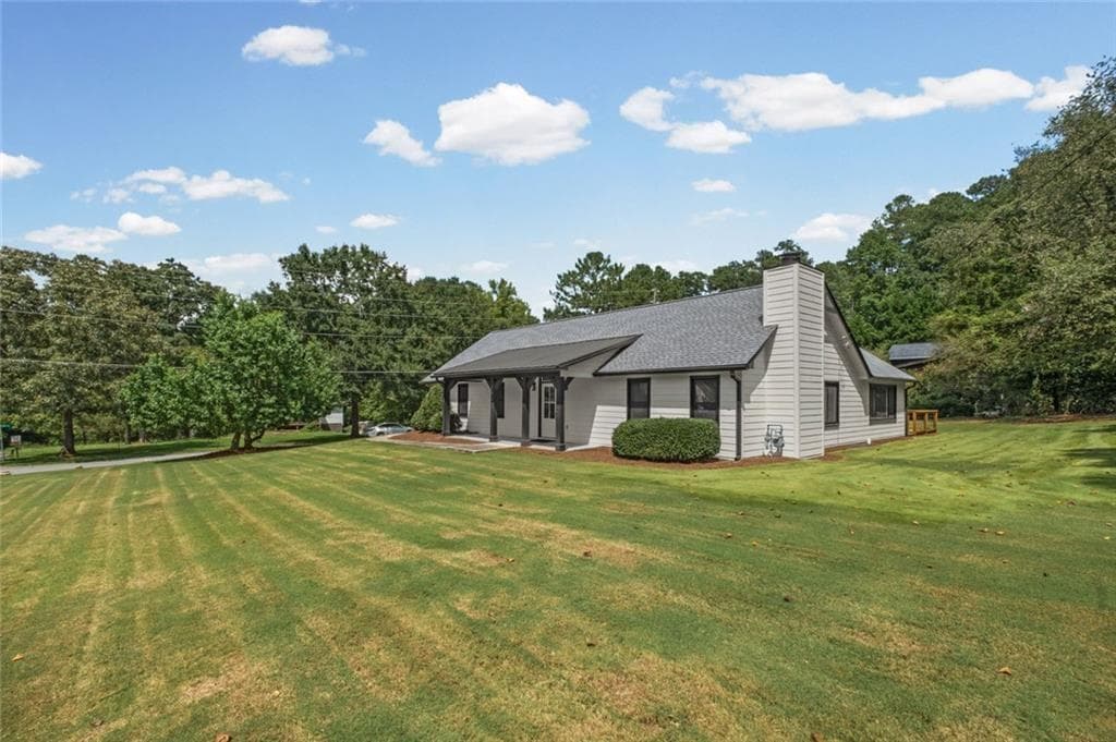 4 bedroom, 3 bathroom, 1,888 sq ft single family residence for sale at 164 Dials Drive, Woodstock, GA 30188 — photo 2
