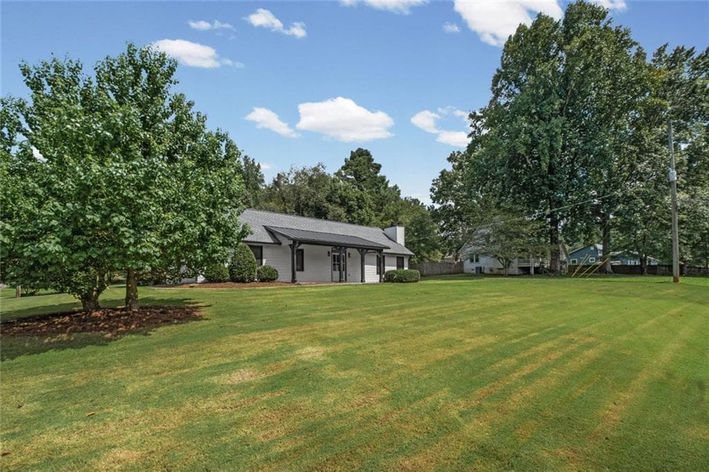 4 bedroom, 3 bathroom, 1,888 sq ft single family residence for sale at 164 Dials Drive, Woodstock, GA 30188 — photo 3