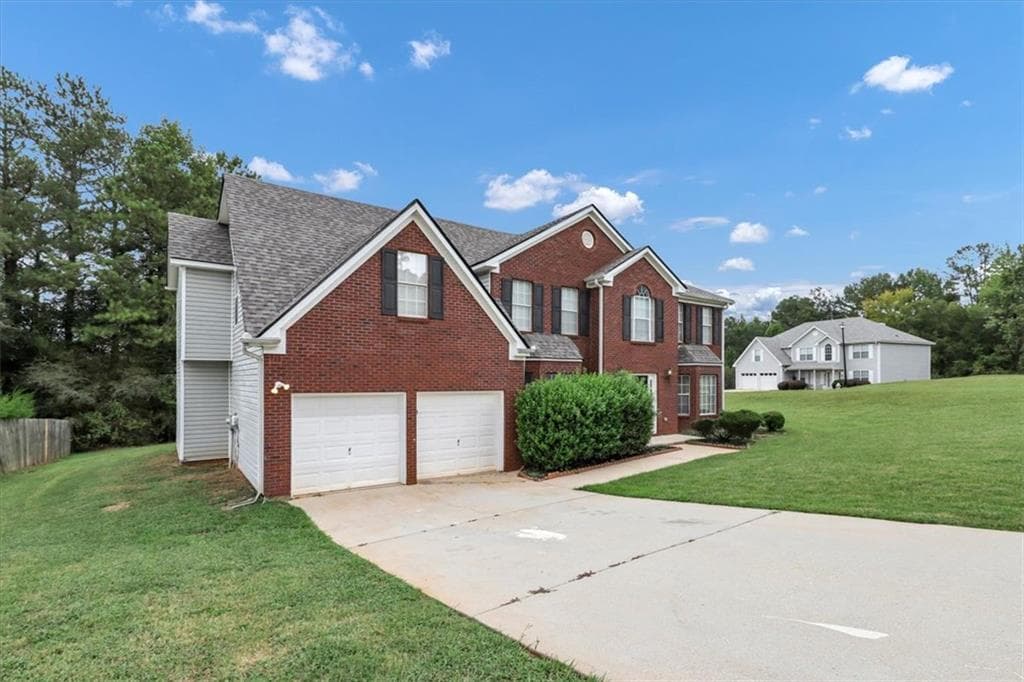 5 bedroom, 3 bathroom, 3,286 sq ft single family residence for sale at 2631 Downing Park Drive, Conyers, GA 30094 — photo 2