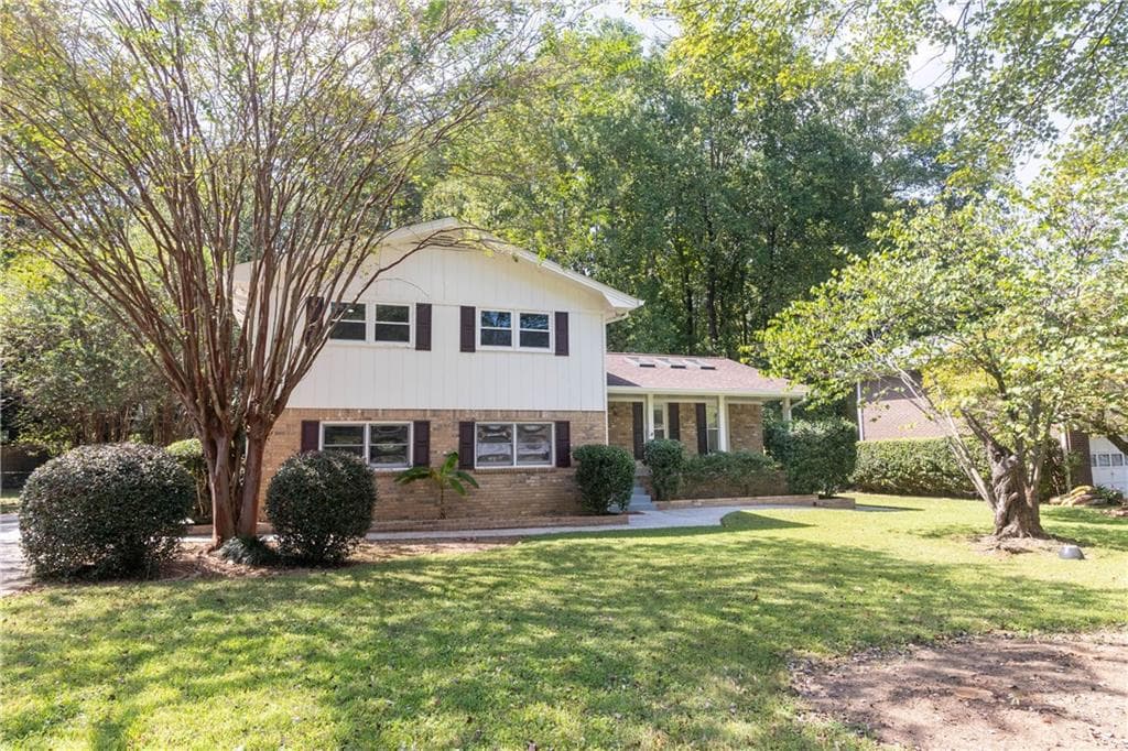 4 bedroom, 3 bathroom, 2,076 sq ft single family residence for sale at 4950 Happy Hollow Rd, Dunwoody, GA 30360 — photo 2