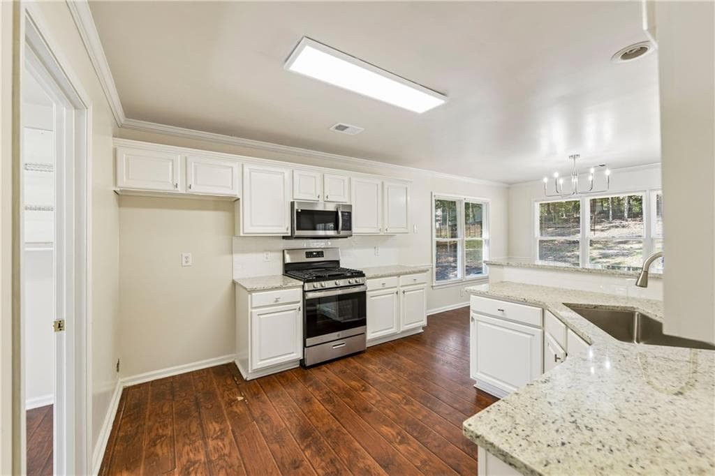 4 bedroom, 3 bathroom, 2,831 sq ft single family residence for sale at 6608 Windbrook Way, Flowery Branch, GA 30542 — photo 6
