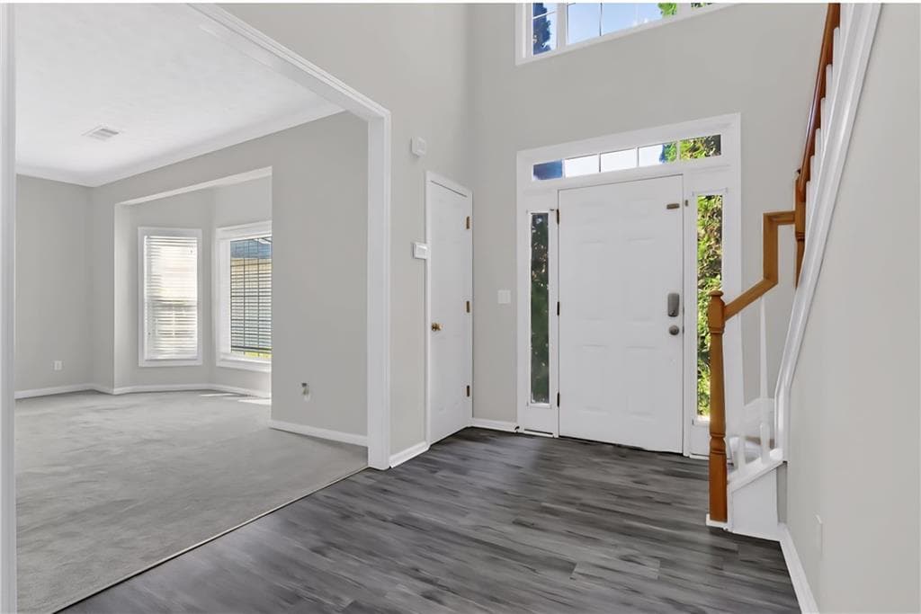 5 bedroom, 4 bathroom, 4,019 sq ft single family residence for sale at 1403 Elderberry Run Cove, Lawrenceville, GA 30043 — photo 2