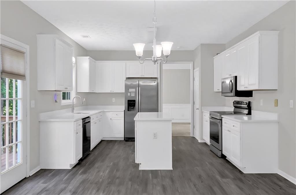 5 bedroom, 4 bathroom, 4,019 sq ft single family residence for sale at 1403 Elderberry Run Cove, Lawrenceville, GA 30043 — photo 4
