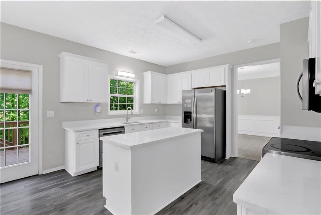 5 bedroom, 4 bathroom, 4,019 sq ft single family residence for sale at 1403 Elderberry Run Cove, Lawrenceville, GA 30043 — photo 6