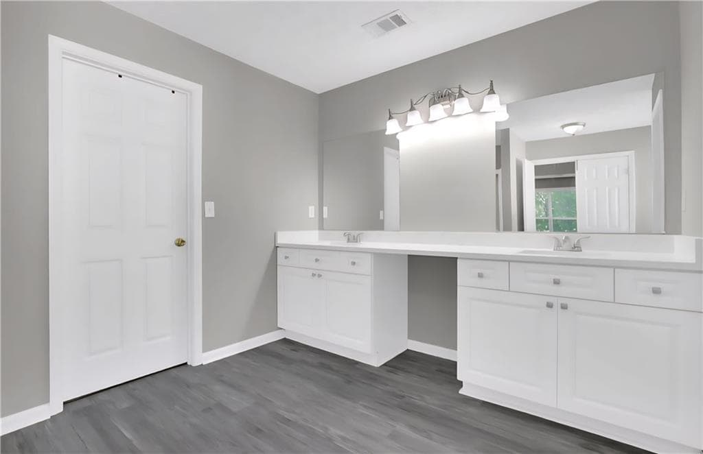 5 bedroom, 4 bathroom, 4,019 sq ft single family residence for sale at 1403 Elderberry Run Cove, Lawrenceville, GA 30043 — photo 9