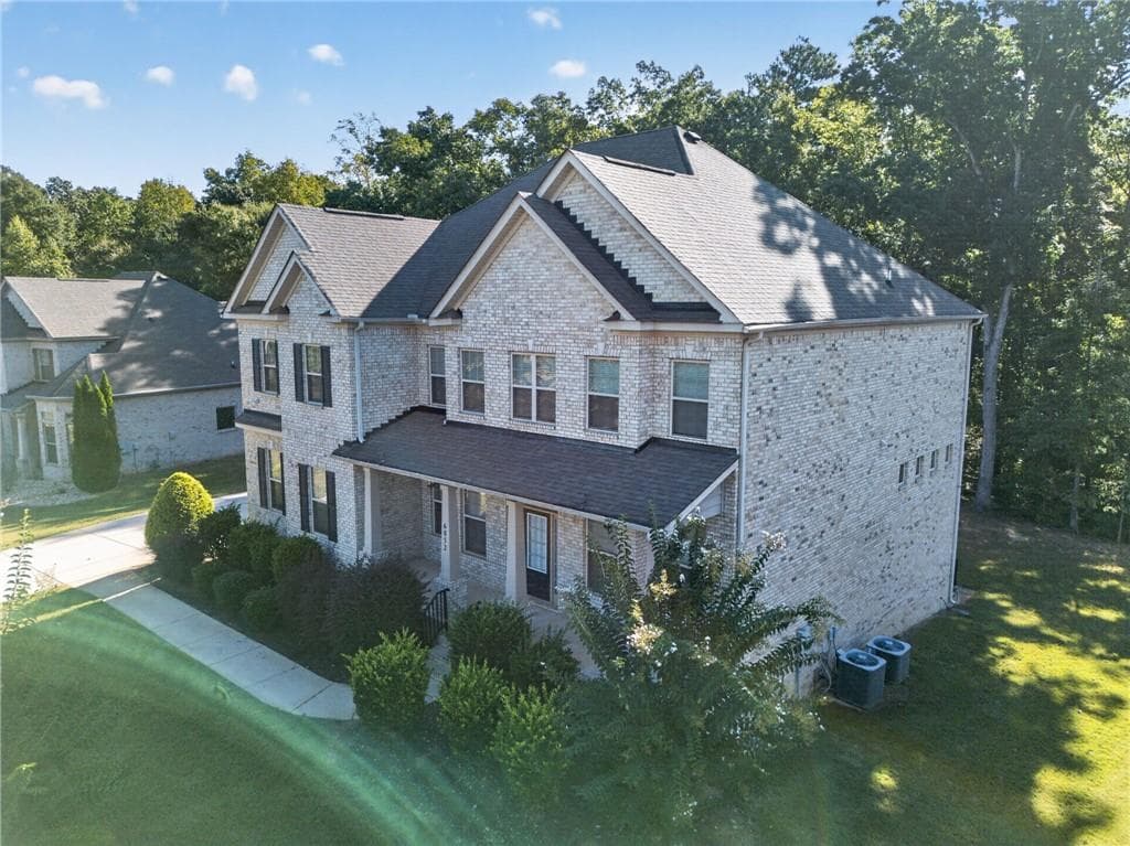 5 bedroom, 4 bathroom, 4,249 sq ft single family residence for sale at 6852 Louis Drive, Locust Grove, GA 30248 — photo 3