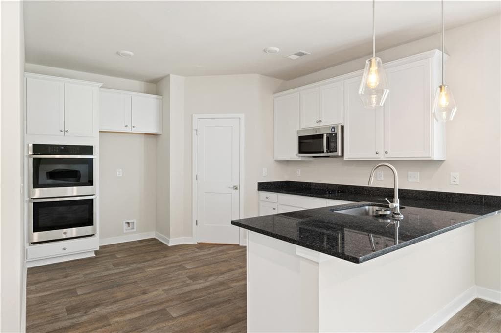 4 bedroom, 3 bathroom, 2,350 sq ft single family residence for sale at 361 Jarrett Street, Fairburn, GA 30213 — photo 8
