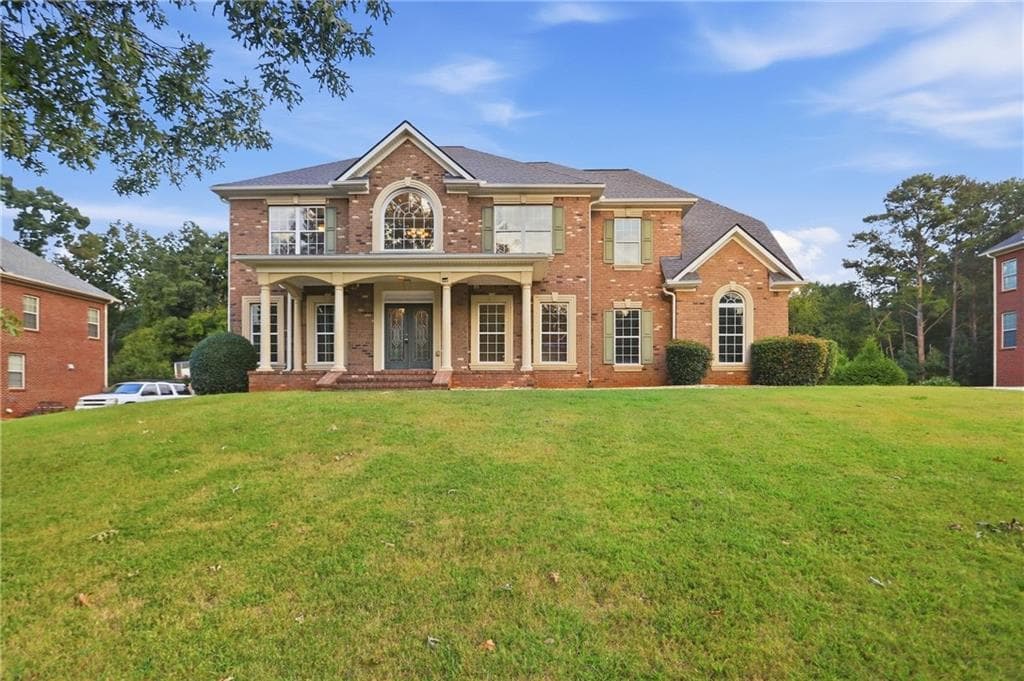 6 bedroom, 5 bathroom, 6,887 sq ft single family residence for sale at 318 Hamilton Drive, Conyers, GA 30094