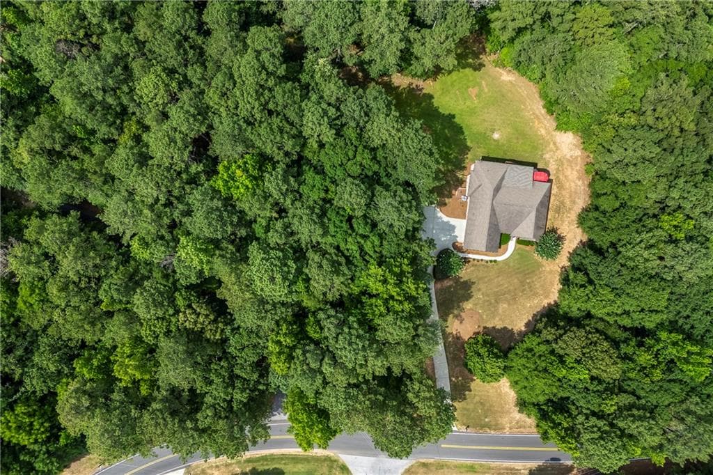 4 bedroom, 2 bathroom, 2,637 sq ft single family residence for sale at 1400 Giles Road, Monroe, GA 30655 — photo 3