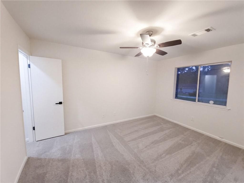 3 bedroom, 2 bathroom, 1,158 sq ft single family residence for sale at 3118 Caliente Lane, Rex, GA 30273 — photo 5