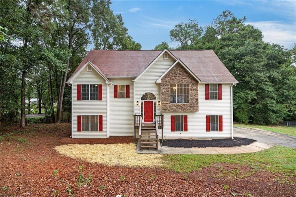 4 bedroom, 3 bathroom, 2,021 sq ft single family residence for sale at 202 Whistleville Court, Winder, GA 30680