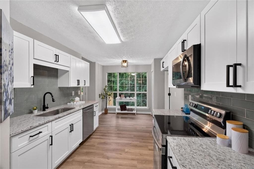 4 bedroom, 3 bathroom, 2,021 sq ft single family residence for sale at 202 Whistleville Court, Winder, GA 30680 — photo 7