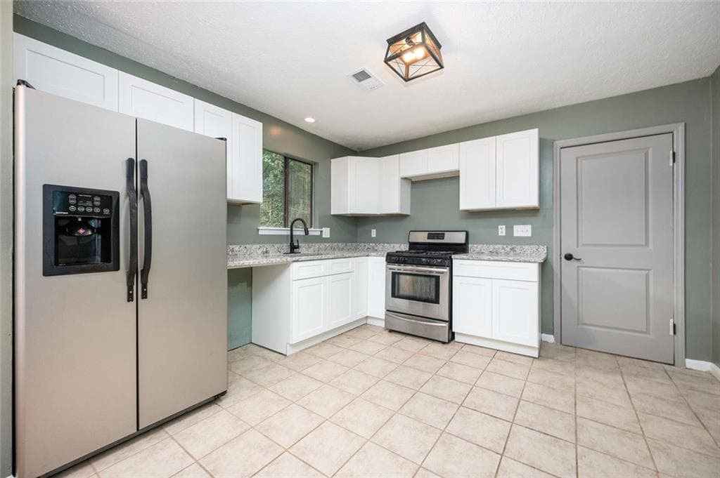 4 bedroom, 2 bathroom, 2,293 sq ft single family residence for sale at 1650 Auden Lane, Norcross, GA 30093 — photo 2