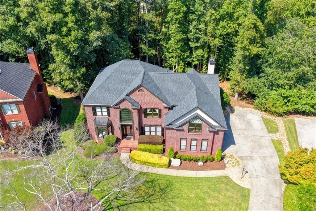 6 bedroom, 5 bathroom, 5,554 sq ft single family residence for sale at 3665 Hickory Branch Trail, Suwanee, GA 30024 — photo 2