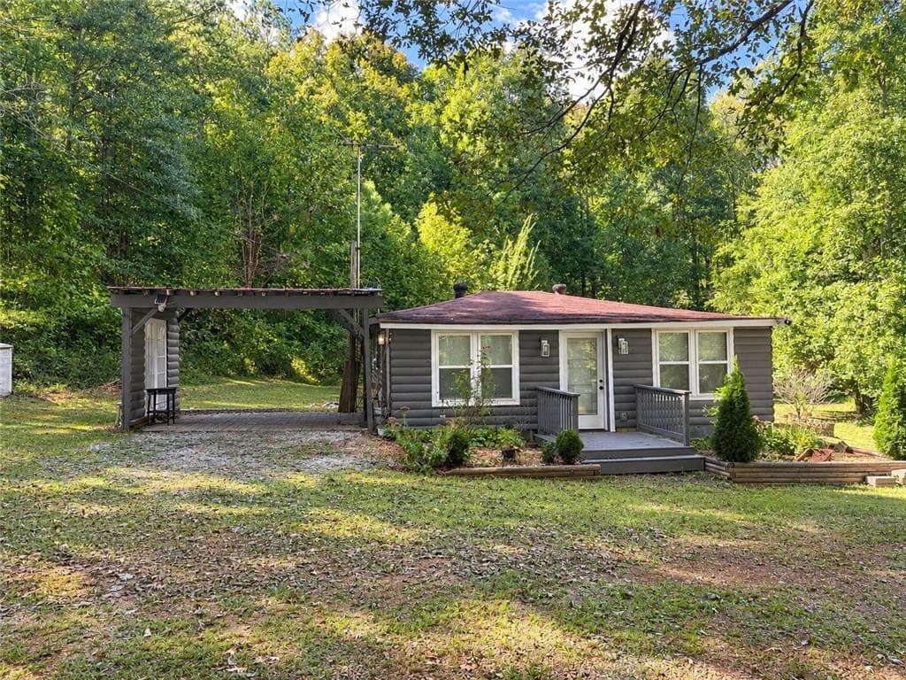 2 bedroom, 1 bathroom, 1,144 sq ft home for sale at 7485 Little Mill Road, Cumming, GA