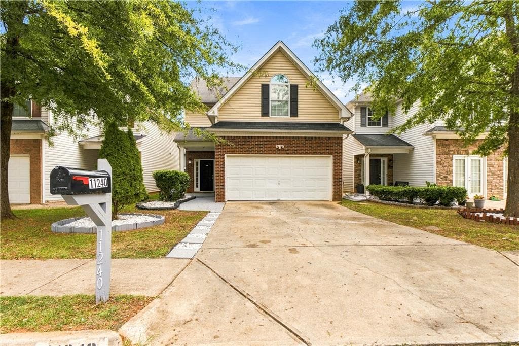 4 bedroom, 3 bathroom, 2,030 sq ft single family residence for sale at 11240 Aliyah Drive, Hampton, GA 30228 — photo 3