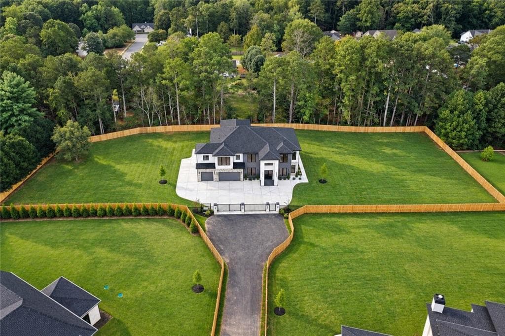 6 bedroom, 5 bathroom, 6,000 sq ft single family residence for sale at 2724 Talley Lane, Buford, GA 30519 — photo 2