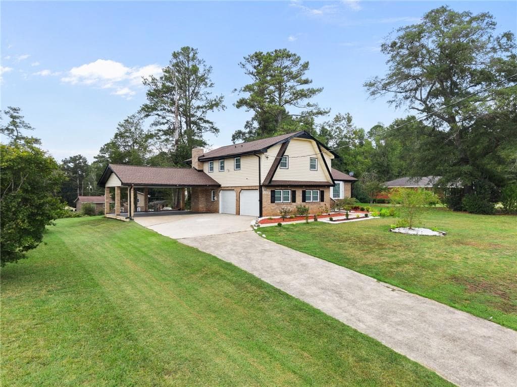 4 bedroom, 3 bathroom, 2,174 sq ft single family residence for sale at 5083 Flakes Mill Road, Ellenwood, GA 30294 — photo 3