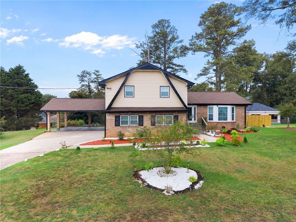 4 bedroom, 3 bathroom, 2,174 sq ft single family residence for sale at 5083 Flakes Mill Road, Ellenwood, GA 30294 — photo 4