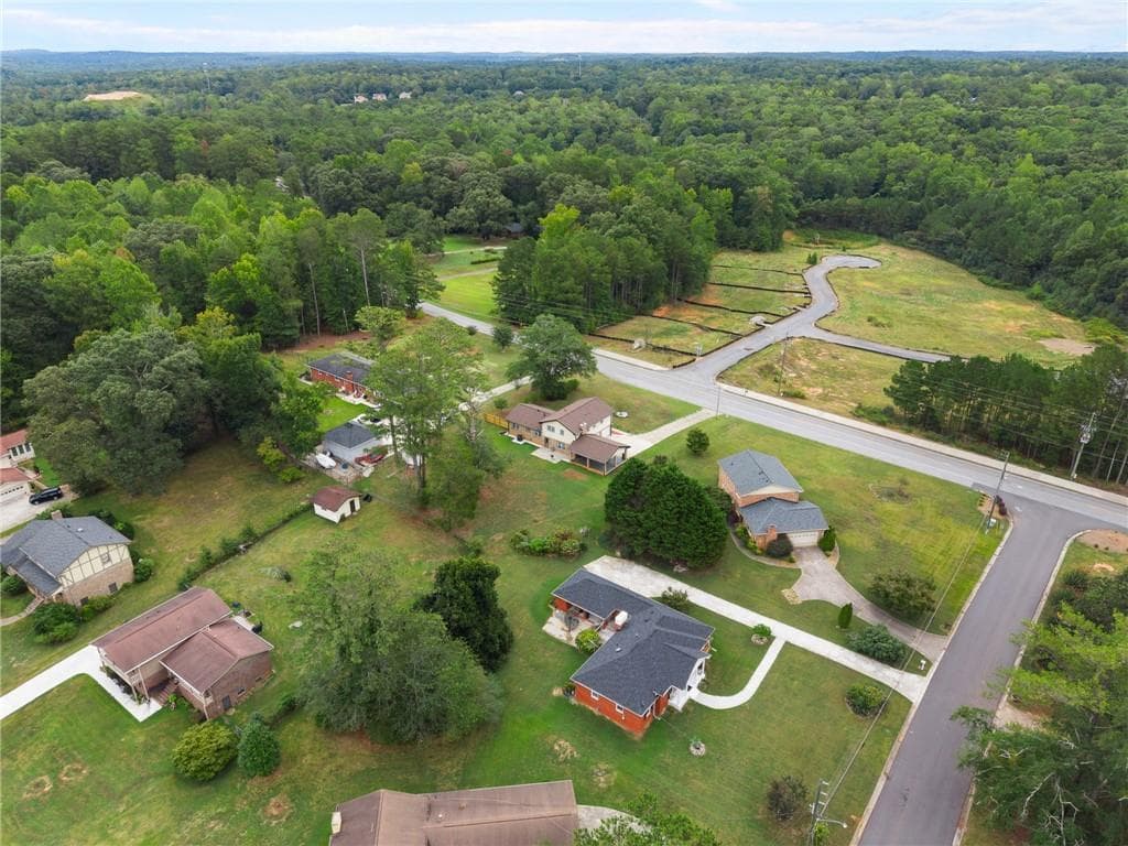 4 bedroom, 3 bathroom, 2,174 sq ft single family residence for sale at 5083 Flakes Mill Road, Ellenwood, GA 30294 — photo 5