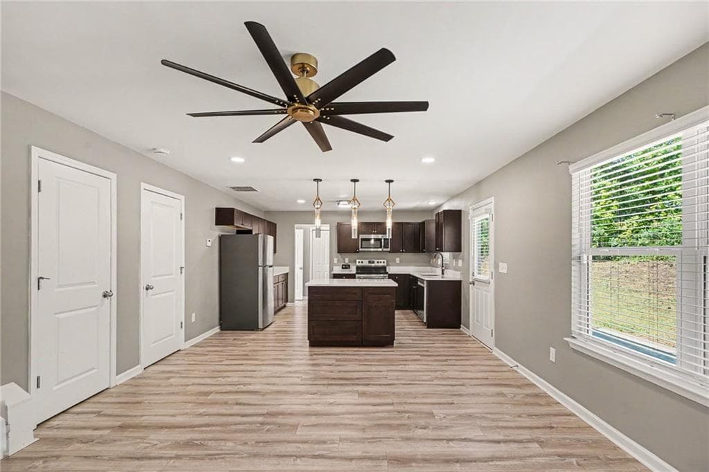 4 bedroom, 3 bathroom, 1,928 sq ft single family residence for sale at 1128 Oak Hollow Lane, Hampton, GA 30228 — photo 4