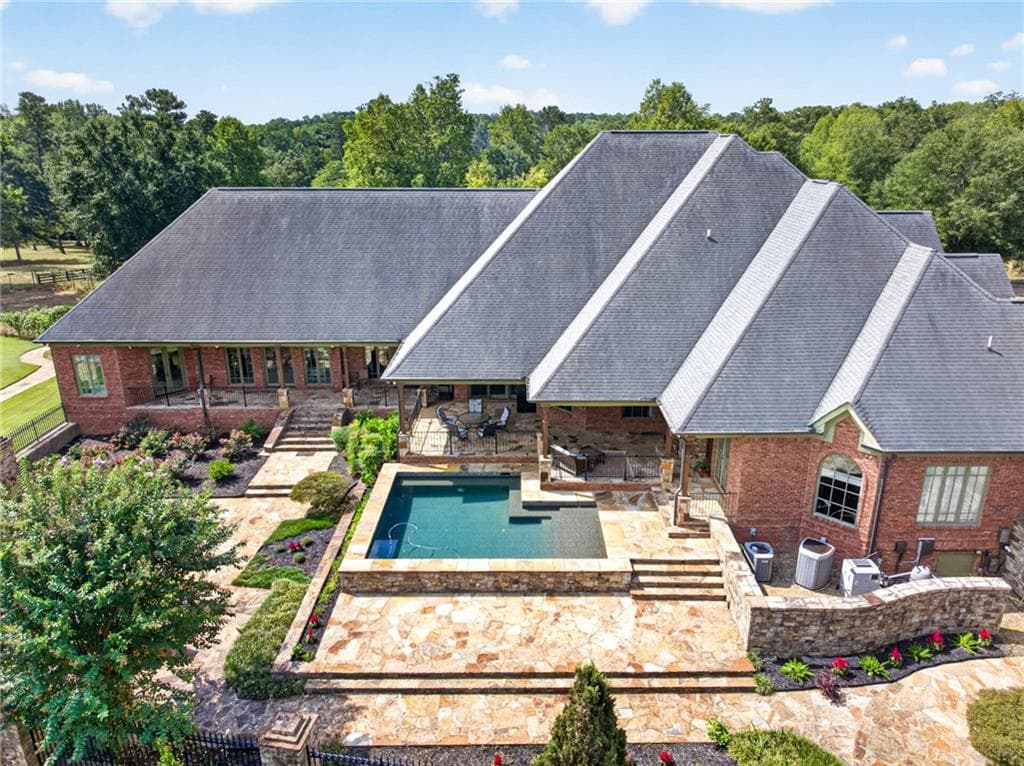 5 bedroom, 5 bathroom, 9,539 sq ft single family residence for sale at 4984 Donald Drive, Loganville, GA 30052 — photo 4