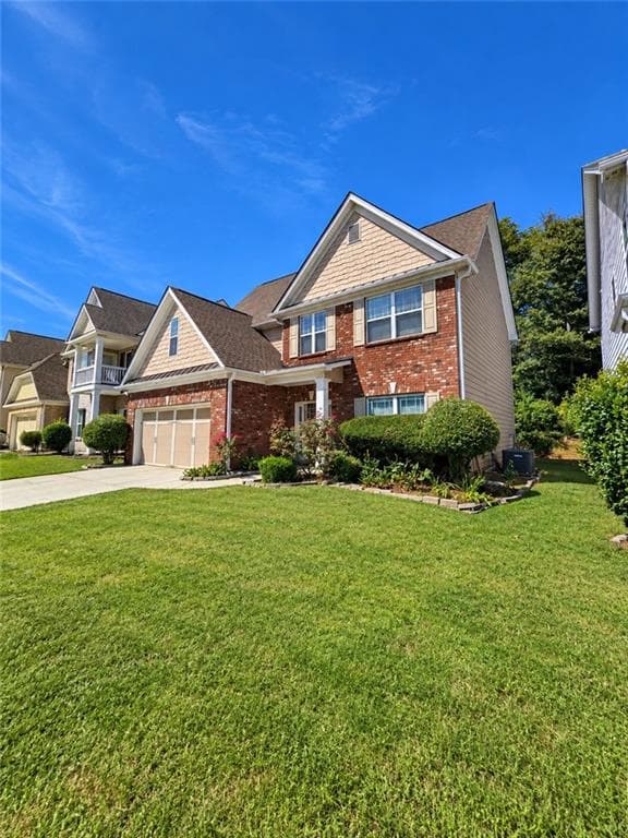 4 bedroom, 3 bathroom, 2,394 sq ft single family residence for sale at 702 Lynnfield Drive, Lawrenceville, GA 30045 — photo 2