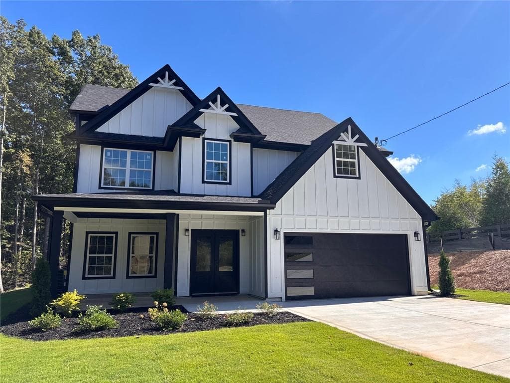 4 bedroom, 3 bathroom, 3,307 sq ft single family residence for sale at 4151 Arthur Miller Road, Gainesville, GA 30507 — photo 2