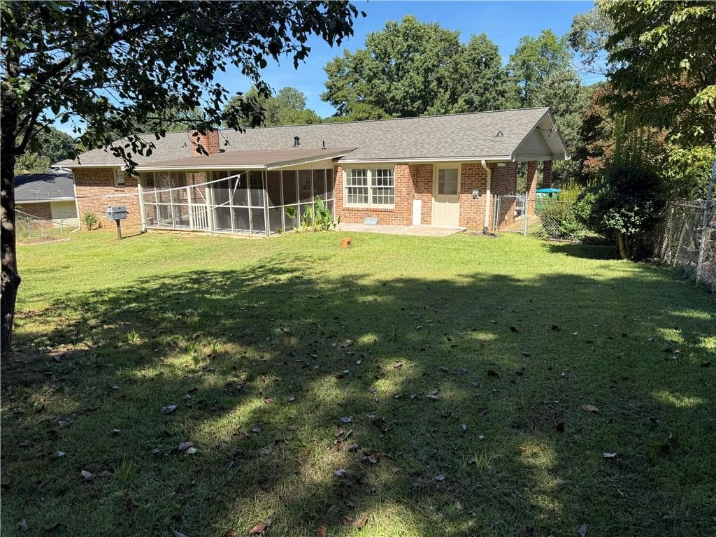 3 bedroom, 2 bathroom, 1,737 sq ft single family residence for sale at 2027 Kensington High Street, Lilburn, GA 30047 — photo 3