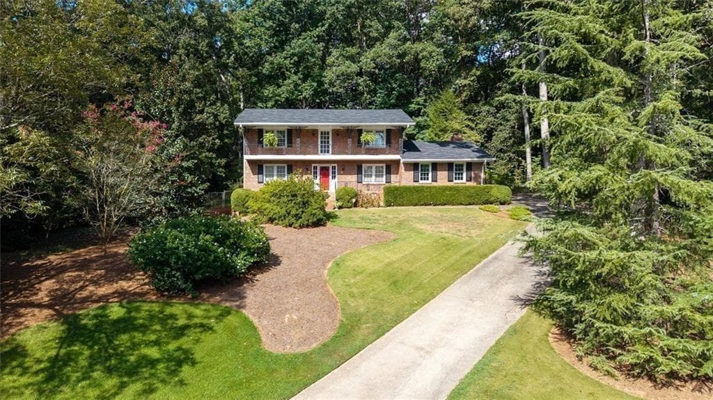 4 bedroom, 3 bathroom, 2,620 sq ft single family residence for sale at 2206 Deer Ridge Drive, Smoke Rise, GA 30087 — photo 2