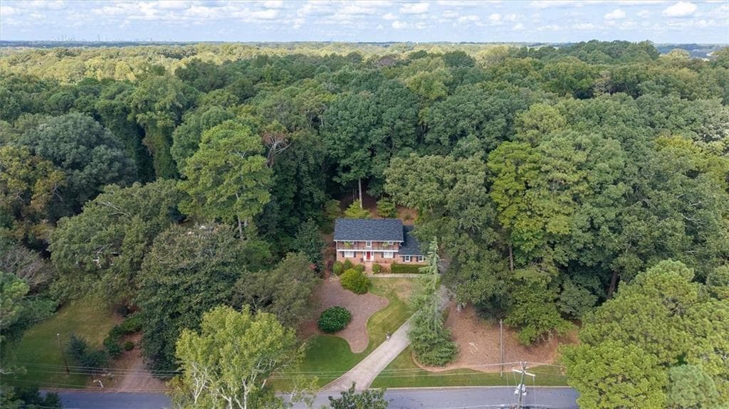 4 bedroom, 3 bathroom, 2,620 sq ft single family residence for sale at 2206 Deer Ridge Drive, Smoke Rise, GA 30087 — photo 3