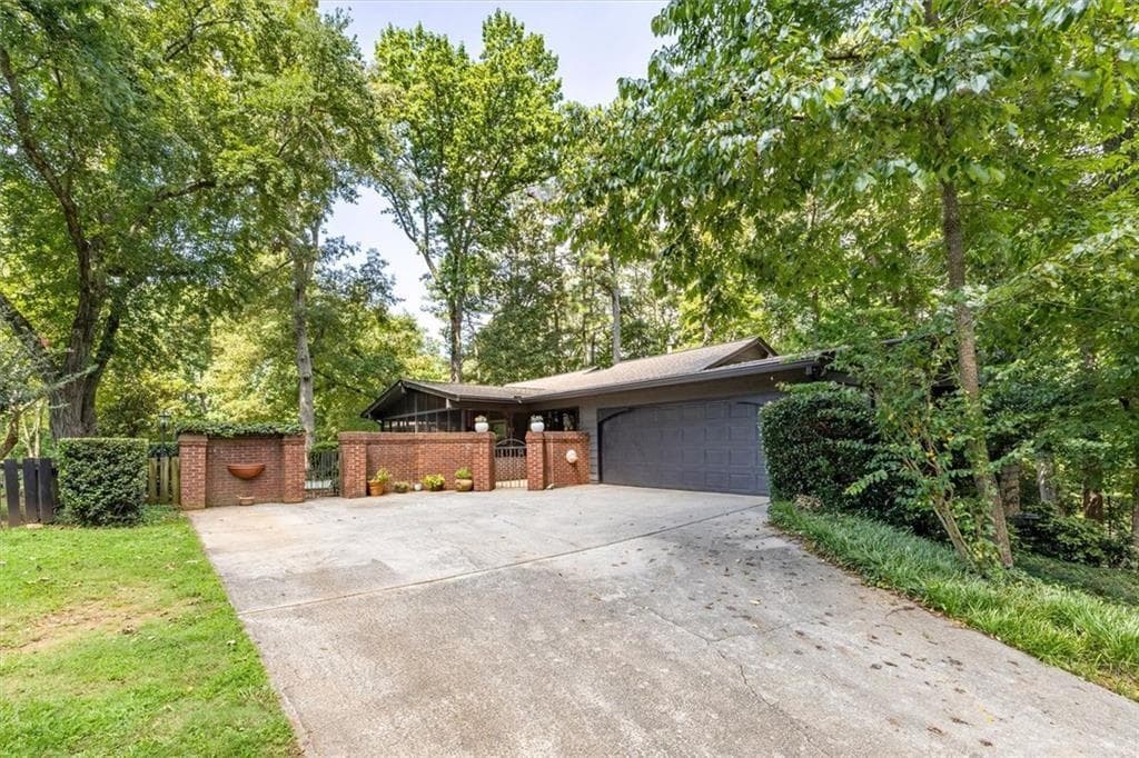 3 bedroom, 5 bathroom, 4,633 sq ft single family residence for sale at 1921 Lilburn Stone Mountain Road, Smoke Rise, GA 30087