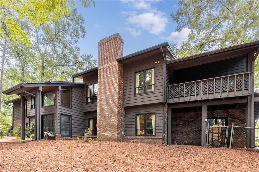 3 bedroom, 5 bathroom, 4,633 sq ft single family residence for sale at 1921 Lilburn Stone Mountain Road, Smoke Rise, GA 30087 — photo 2