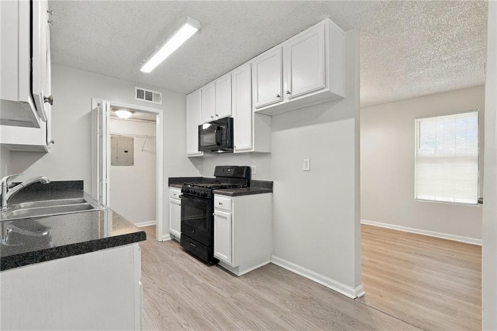 3 bedroom, 2 bathroom, 1,134 sq ft single family residence for sale at 6237 Creekford Drive, Lithonia, GA 30058 — photo 4
