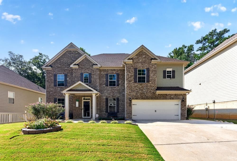 6 bedroom, 4 bathroom, 4,050 sq ft single family residence for sale at 2193 Dodson Woods Drive, Fairburn, GA 30213 — photo 2