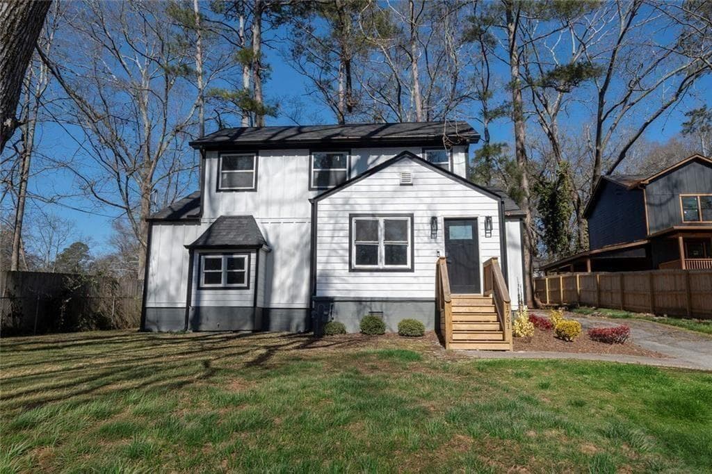 3 bedroom, 2 bathroom, 1,317 sq ft single family residence for sale at 1751 S Olympian Way, Atlanta, GA 30310 — photo 1 of 14