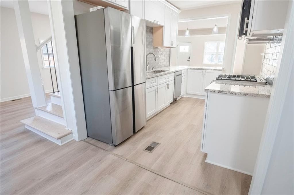 3 bedroom, 2 bathroom, 1,317 sq ft single family residence for sale at 1751 S Olympian Way, Atlanta, GA 30310 — photo 6