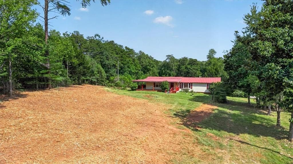 3 bedroom, 2 bathroom, 2,000 sq ft single family residence for sale at 205 Upper Bethany Trail, Ball Ground, GA 30107 — photo 3