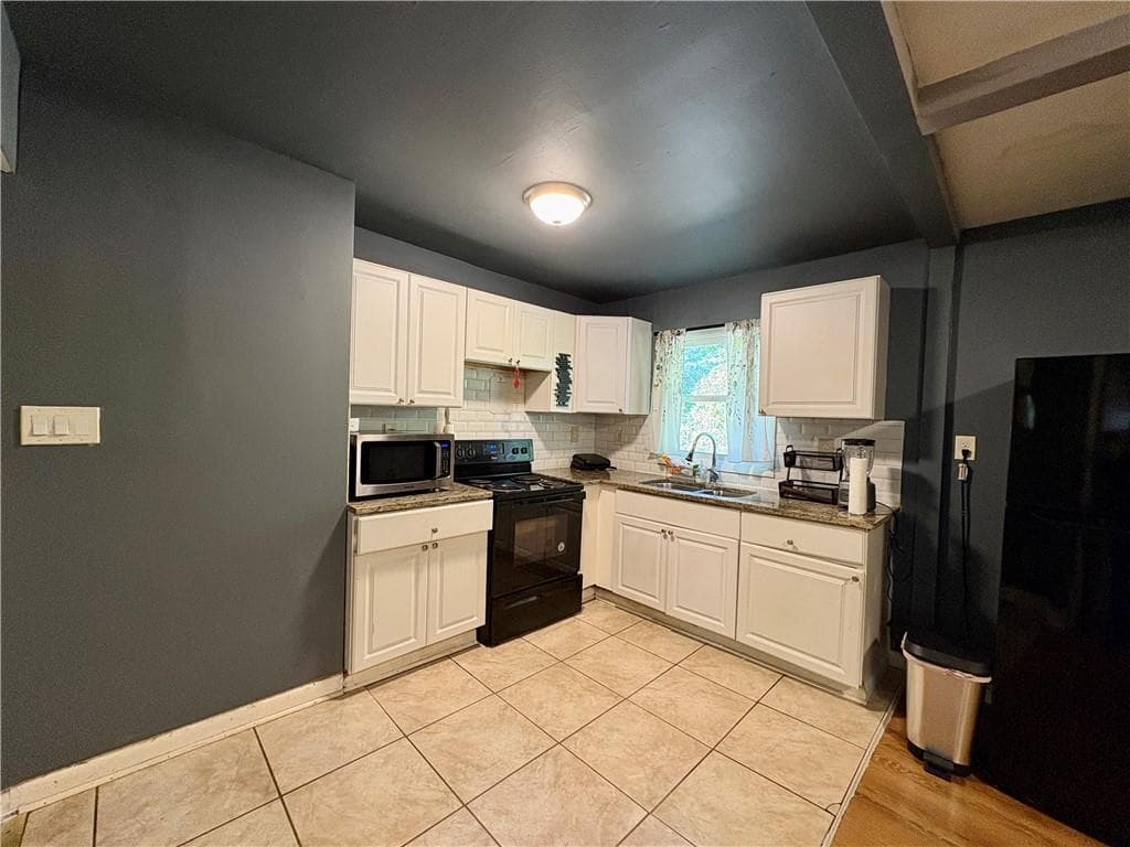 4 bedroom, 2 bathroom, 1,152 sq ft single family residence for sale at 79 Howell Drive, Atlanta, GA 30331 — photo 9