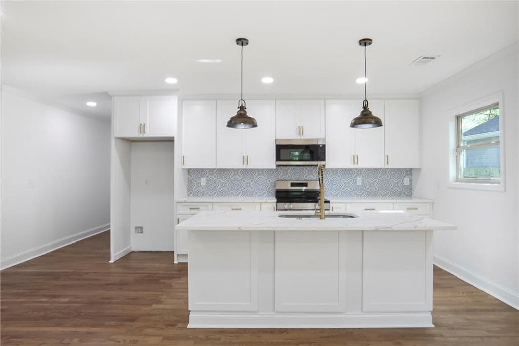 4 bedroom, 3 bathroom, 1,980 sq ft single family residence for sale at 1321 Avon Avenue, Atlanta, GA 30310 — photo 5