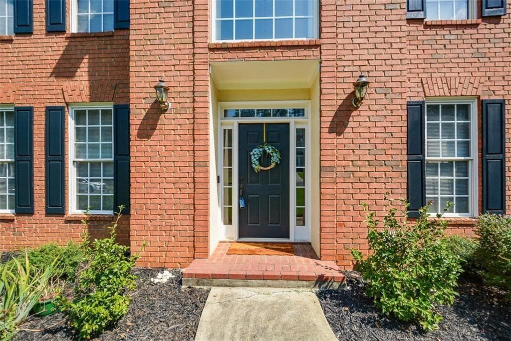 4 bedroom, 3 bathroom, 2,602 sq ft single family residence for sale at 3988 Madison Main, Kennesaw, GA 30144 — photo 2