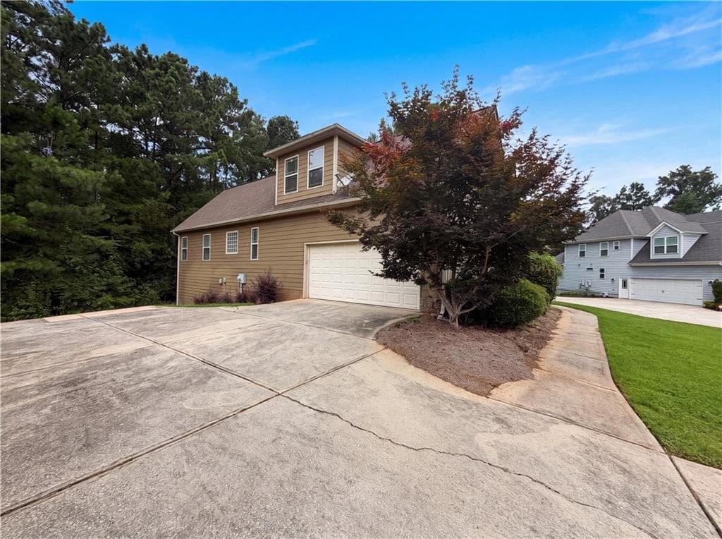 4 bedroom, 3 bathroom, 4,811 sq ft single family residence for sale at 212 Westwind Drive, Newnan, GA 30263 — photo 5